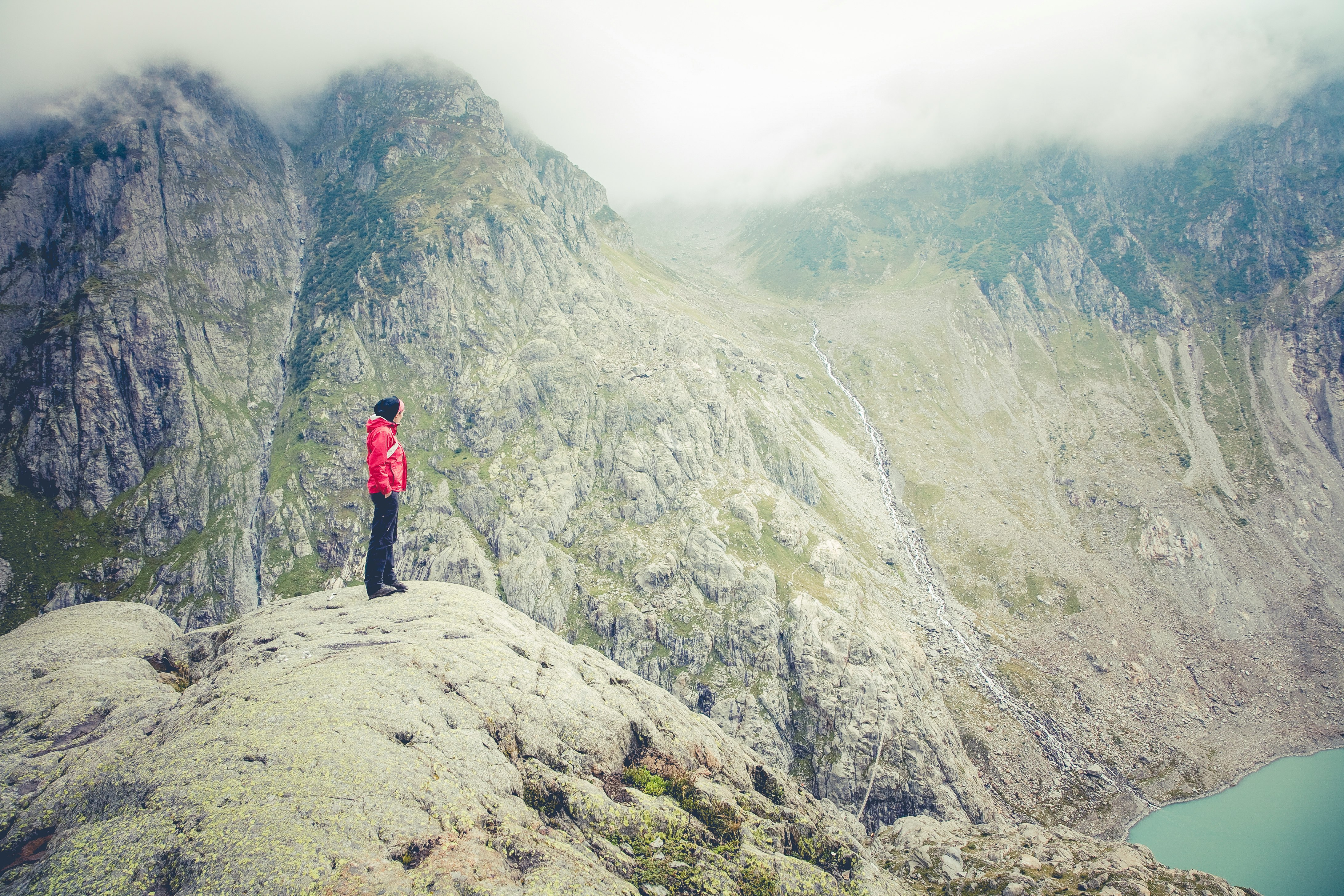 man standing on peak